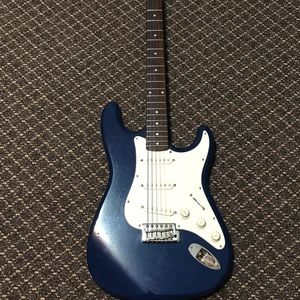 Electric squier strat by fender guitar